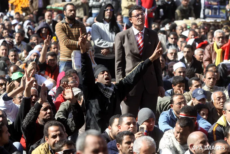 Thousands of Egyptian protesters attend a rally in Cairo's Tahrir Square on January 27, 2012 to demand democratic change, a year after the uprising that toppled Hosni Mubarak. Photo by Naaman Omar