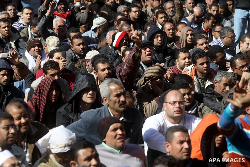 Thousands of Egyptian protesters attend a rally in Cairo's Tahrir Square on January 27, 2012 to demand democratic change, a year after the uprising that toppled Hosni Mubarak. Photo by Naaman Omar