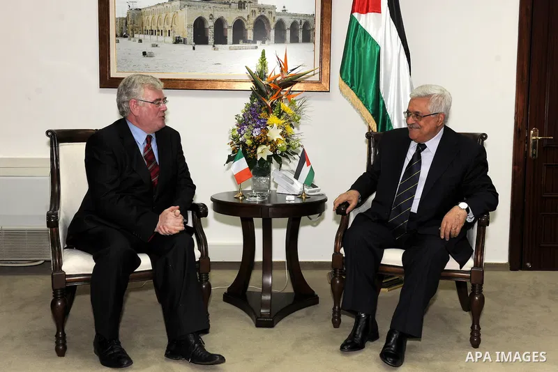 Palestinian President Mahmoud Abbas (Abu Mazen) meets Irish Foreign Minister Eamon Gilmore in the West Bank city of Ramallah January 28, 2012. Photo by Thaer Ganaim
