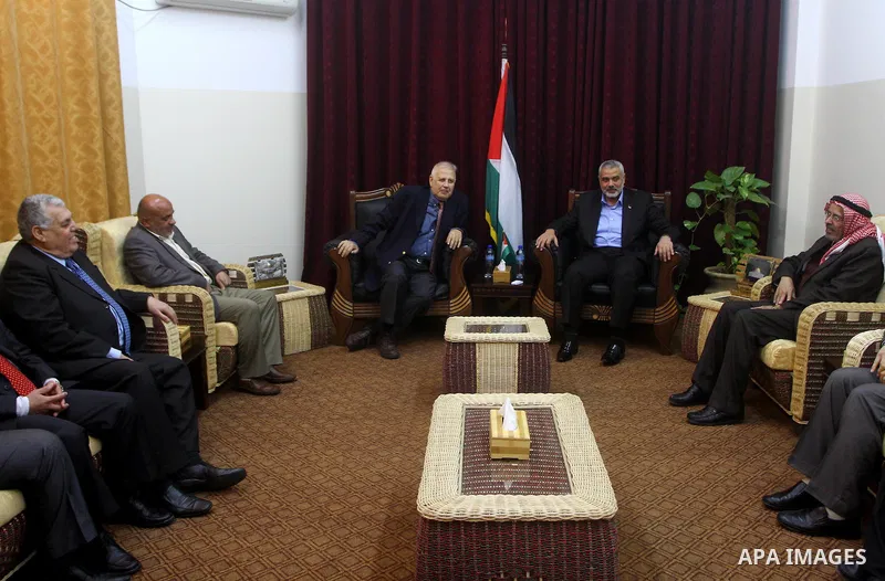 Palestinian Prime Minister in Gaza Strip, Ismail Haniya Meet with the head of Central Elections Committee, Hanna Nasser, in Gaza city, on Jan. 29, 2012. Photo by Ashraf Amra
