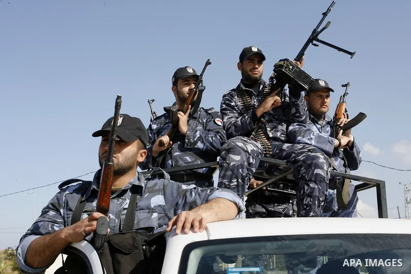 Hamas police officers display their skills during a graduation ceremony from a military course in the southern Gaza Strip city of Khan Yunis on January 29, 2012. Photo by Abed Rahim Khatib