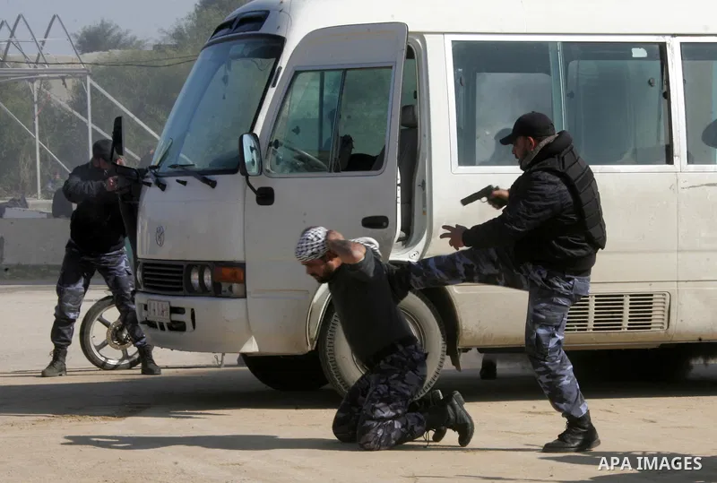 Hamas police officers display their skills during a graduation ceremony from a military course in the southern Gaza Strip city of Khan Yunis on January 29, 2012. Photo by Abed Rahim Khatib