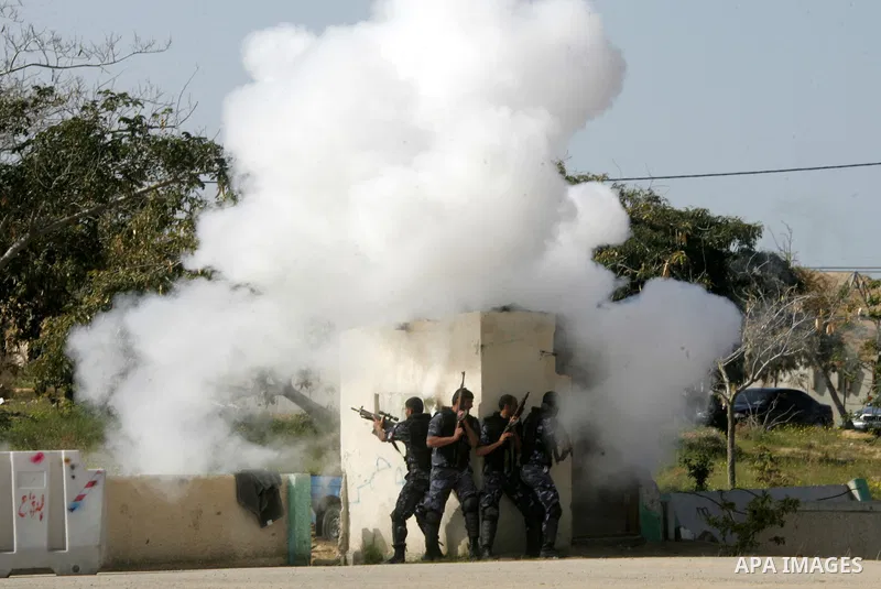 Hamas police officers display their skills during a graduation ceremony from a military course in the southern Gaza Strip city of Khan Yunis on January 29, 2012. Photo by Abed Rahim Khatib