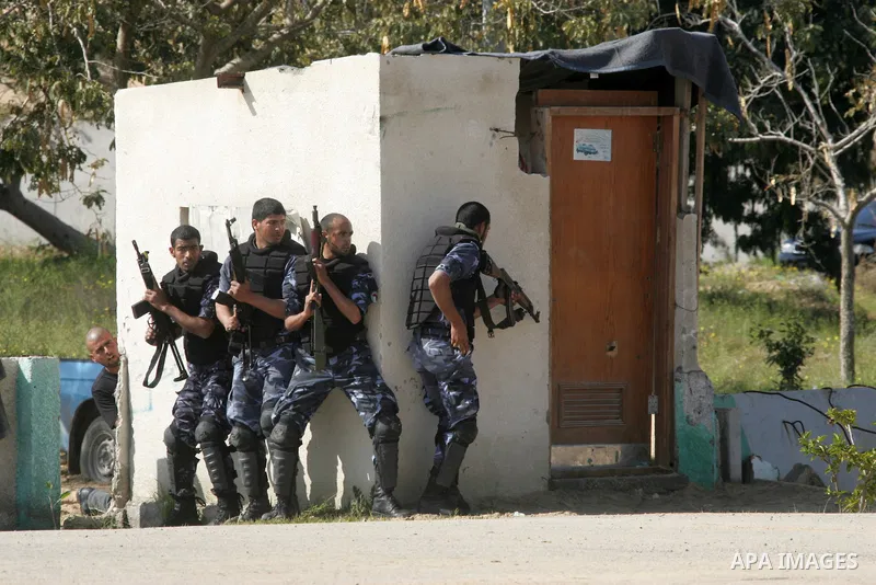 Hamas police officers display their skills during a graduation ceremony from a military course in the southern Gaza Strip city of Khan Yunis on January 29, 2012. Photo by Abed Rahim Khatib