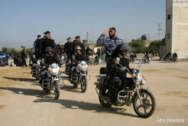 Hamas police officers display their skills during a graduation ceremony from a military course in the southern Gaza Strip city of Khan Yunis on January 29, 2012. Photo by Abed Rahim Khatib
