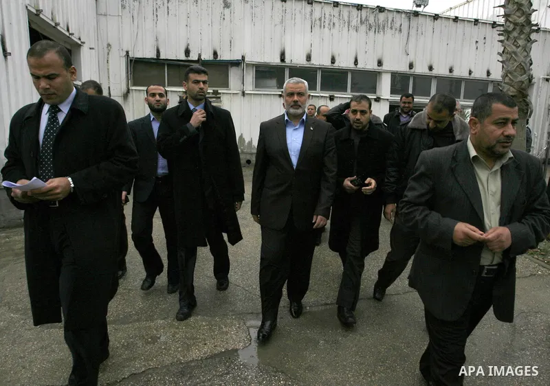 Palestinian Prime Minister in Gaza Strip, Ismail Haniya, arrived to the Rafah border crossing in the southern Gaza Strip on Jan. 30, 2012. as he leaves on a regional tour expected to include stops in Iran, Qatar and Bahr...