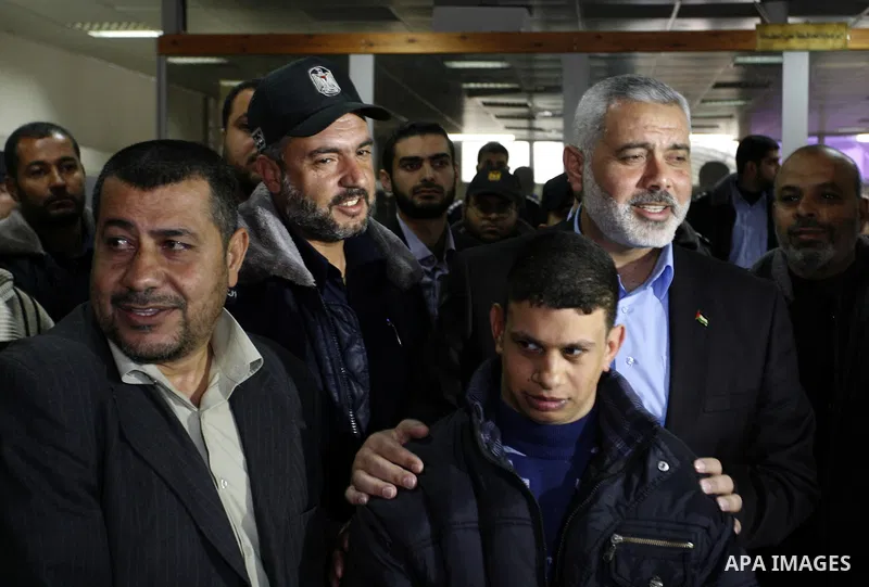 Palestinian Prime Minister in Gaza Strip, Ismail Haniya, arrived to the Rafah border crossing in the southern Gaza Strip on Jan. 30, 2012. as he leaves on a regional tour expected to include stops in Iran, Qatar and Bahr...