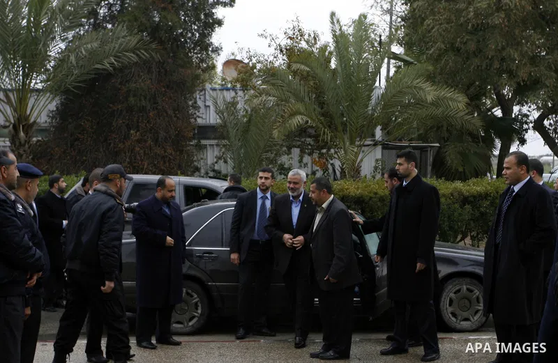 Palestinian Prime Minister in Gaza Strip, Ismail Haniya, arrived to the Rafah border crossing in the southern Gaza Strip on Jan. 30, 2012. as he leaves on a regional tour expected to include stops in Iran, Qatar and Bahr...
