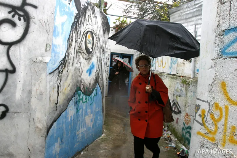 Raquel Rolnik, United Nations Special Rapporteur on adequate housing, visits the Palestinian Kurd family, whose house was taken over by Jewish settlers in Jerusalem's Sheikh Jarrah neighbourhood, on January 30, 2012. The...