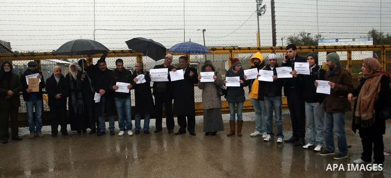 A Palestinian demonstrator shouts slogans during a protest in support of jailed Islamic Jihad spokesman Khodr Adnan outside Israel's Ofer prison near the West Bank town of Betunia on January 30, 2012. Adnan has been on h...