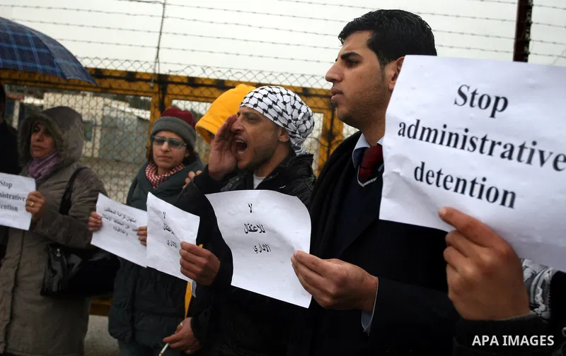 A Palestinian demonstrator shouts slogans during a protest in support of jailed Islamic Jihad spokesman Khodr Adnan outside Israel's Ofer prison near the West Bank town of Betunia on January 30, 2012. Adnan has been on h...