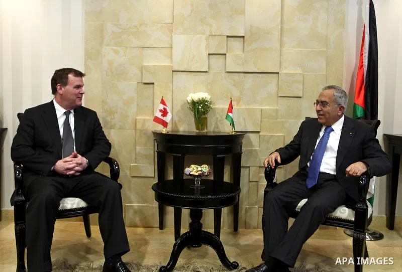 Palestinian Prime Minister, Salam Fayyad, receives Minister of Canadian Foreign Mr. John Baird, in the West bank City of Ramallah, on Jan. 30, 2012. Photo by Mustafa Abu Dayeh