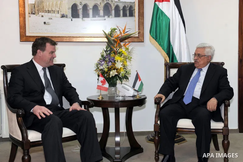 Palestinian President, Mahmoud Abbas (Abu Mazen), receives Minister of Canadian Foreign Mr. John Baird, in the West bank City of Ramallah, on Jan. 30, 2012. Photo by Thaer Ganaim