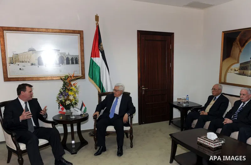 Palestinian President, Mahmoud Abbas (Abu Mazen), receives Minister of Canadian Foreign Mr. John Baird, in the West bank City of Ramallah, on Jan. 30, 2012. Photo by Thaer Ganaim