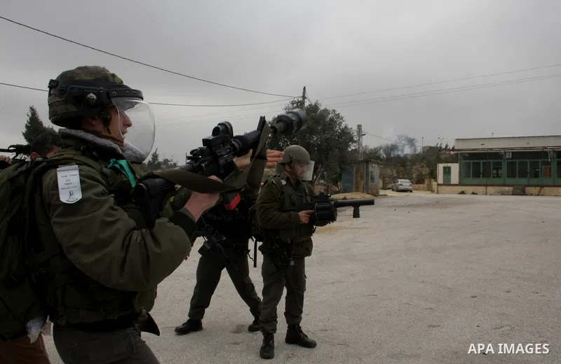 Protesters clash with Israeli soldiers during a demonstration by Palestinian and foreign activists who tried to reach Route 60, the main Jewish settler road in the West Bank, to protest against Israeli curbs on Palestini...