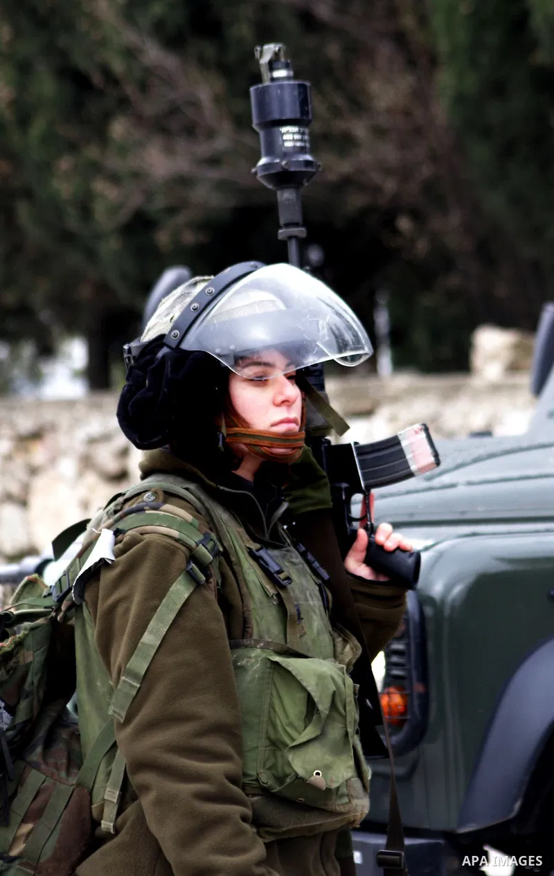 Protesters clash with Israeli soldiers during a demonstration by Palestinian and foreign activists who tried to reach Route 60, the main Jewish settler road in the West Bank, to protest against Israeli curbs on Palestini...
