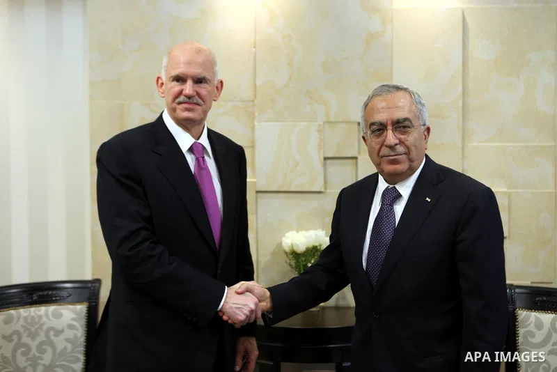 Palestinian Prime Minister, Salam Fayyad meets with the former Greek Prime Minister, George Papandreou in the West Bank city of Ramallah on Jan. 31, 2012. Photo by Mustafa Abu Dayeh