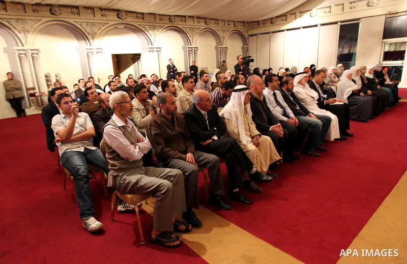 Palestinian Prime Minister in Gaza Strip, Ismail Haniyah receives released prisoners, deported to the Qatar, in the Qatari capital of Doha on Jan. 31,2012. photo by Mohammed Al-Ostaz