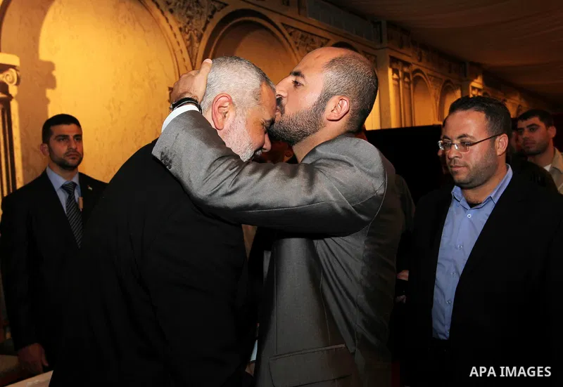 Palestinian Prime Minister in Gaza Strip, Ismail Haniyah receives released prisoners, deported to the Qatar, in the Qatari capital of Doha on Jan. 31,2012. photo by Mohammed Al-Ostaz