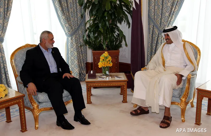 Palestinian Prime Minister in Gaza Strip, Ismail Haniyah meets with Crown Prince of Qatari, in the Qatari capital of Doha on Feb. 01, 2012. Photo by Mohammed Al-Ostaz.