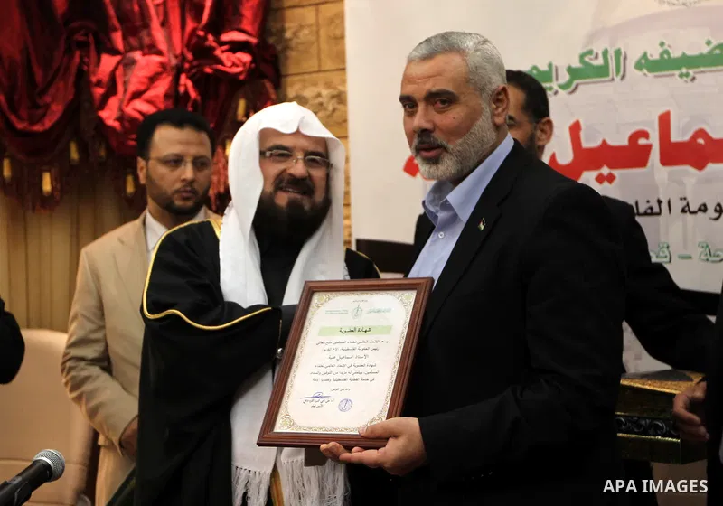 Palestinian Prime Minister in Gaza Strip, Ismail Haniyah, speaks during a meeting at the International Union for Muslim Scholars in the Qatari capital Doha on Feb. 01, 2012. Haniya is on the first leg of a regional tour...