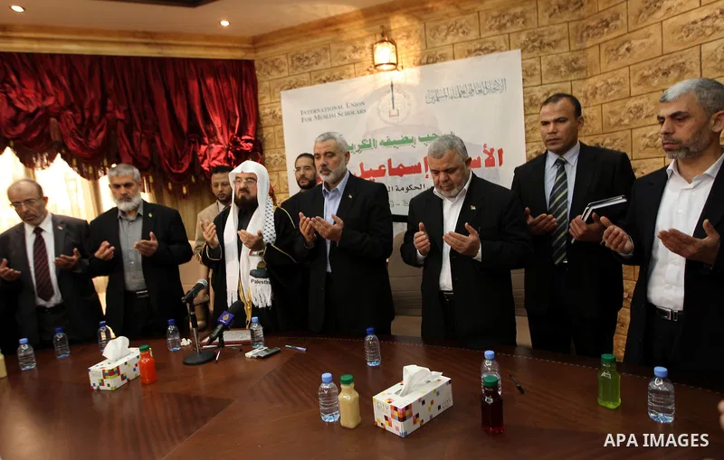 Palestinian Prime Minister in Gaza Strip, Ismail Haniyah, speaks during a meeting at the International Union for Muslim Scholars in the Qatari capital Doha on Feb. 01, 2012. Haniya is on the first leg of a regional tour...