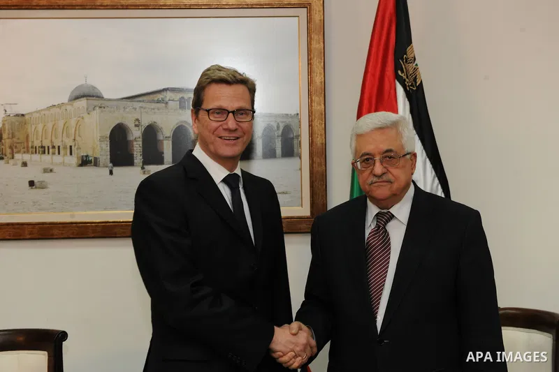 Palestinian President Mahmoud Abbas (R) meets with Germany's Foreign Minister Guido Westerwelle in the West Bank city of Ramallah, 01 February 2012. Photo by Thaer Ghanaim