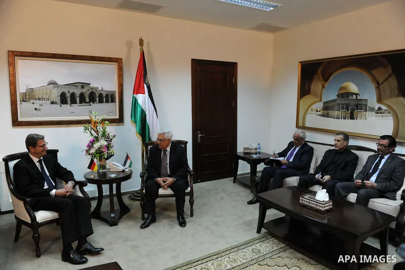 Palestinian President Mahmoud Abbas (R) meets with Germany's Foreign Minister Guido Westerwelle in the West Bank city of Ramallah, 01 February 2012. Photo by Thaer Ghanaim