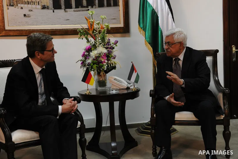 Palestinian President Mahmoud Abbas (R) meets with Germany's Foreign Minister Guido Westerwelle in the West Bank city of Ramallah, 01 February 2012. Photo by Thaer Ghanaim