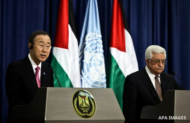 United Nations Secretary-General Ban Ki-moon (L) and Palestinian president Mahmud Abbas hold a joint press conference following a meeting in the West Bank city of Ramallah on February 1, 2012. Ban called on Israel to cre...