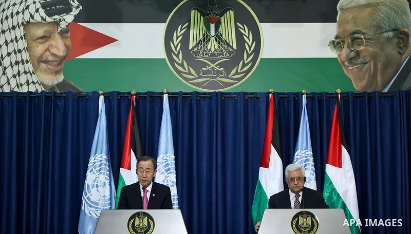 United Nations Secretary-General Ban Ki-moon (L) and Palestinian president Mahmud Abbas hold a joint press conference following a meeting in the West Bank city of Ramallah on February 1, 2012. Ban called on Israel to cre...