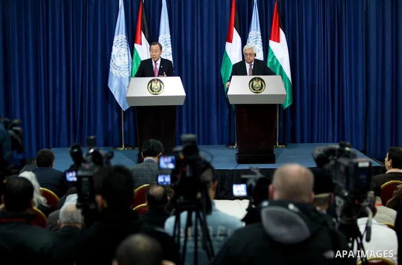United Nations Secretary-General Ban Ki-moon (L) and Palestinian president Mahmud Abbas hold a joint press conference following a meeting in the West Bank city of Ramallah on February 1, 2012. Ban called on Israel to cre...