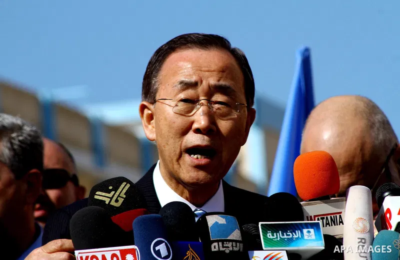 UN secretary general Ban Ki-moon speaks during a press conference as he visits the construction site of a housing project in Khan Yunis in the southern Gaza Strip on February 2, 2012. Protesters threw shoes, sand and sma...