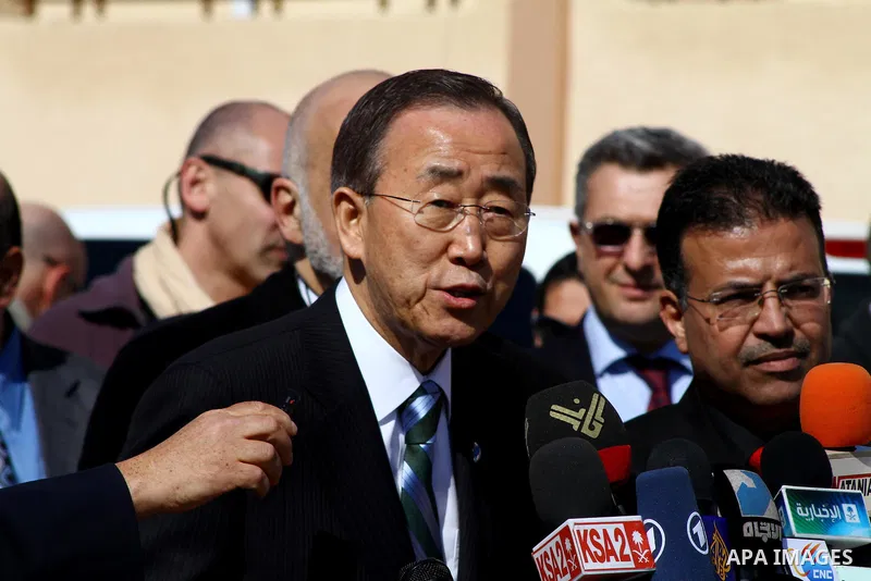 UN secretary general Ban Ki-moon speaks during a press conference as he visits the construction site of a housing project in Khan Yunis in the southern Gaza Strip on February 2, 2012. Protesters threw shoes, sand and sma...