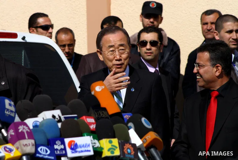 UN secretary general Ban Ki-moon speaks during a press conference as he visits the construction site of a housing project in Khan Yunis in the southern Gaza Strip on February 2, 2012. Protesters threw shoes, sand and sma...
