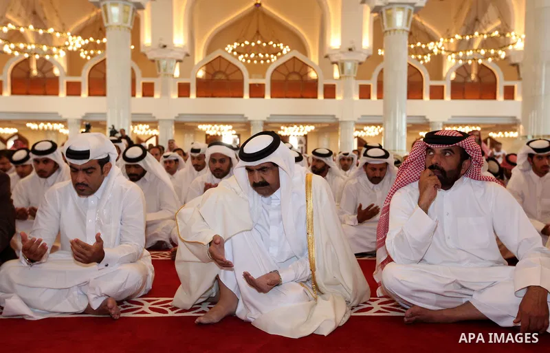 Qatari Emir Sheikh Hamad bin Khalifa Al Thani (c) attend Friday prayers in the mosque of Muhammad ibn Abed al-Wahhab in the Qatari capital of Doha on Feb. 03, 2012. Photo by Mohammed Al-Ostaz