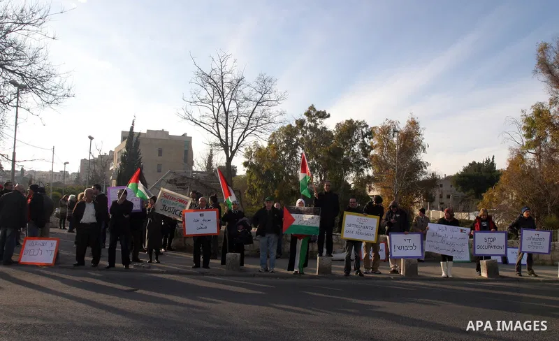 Palestinian, foreign and Israeli left-wing activists participate in a demonstration in the east Jerusalem neighborhood of Sheikh Jarrah, Friday, Feb. 03, 2012. The protest was organized by groups supporting Palestinians...