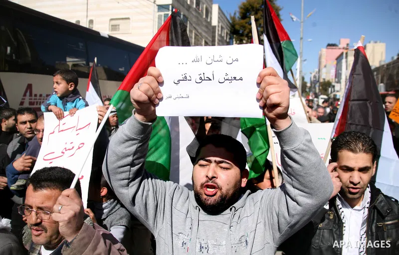 Palestinians protest against rising prices and taxes in the West Bank city of Hebron. Saturday, Feb. 4, 2012. Palestinian Authority Prime Minister Salam Fayyad has sparked a furor with a push to get Palestinians to pay m...