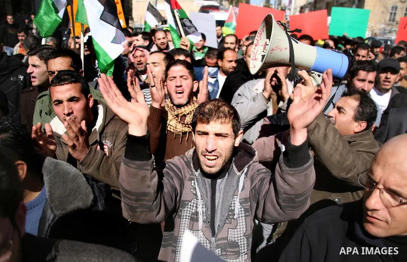 Palestinians protest against rising prices and taxes in the West Bank city of Hebron. Saturday, Feb. 4, 2012. Palestinian Authority Prime Minister Salam Fayyad has sparked a furor with a push to get Palestinians to pay m...