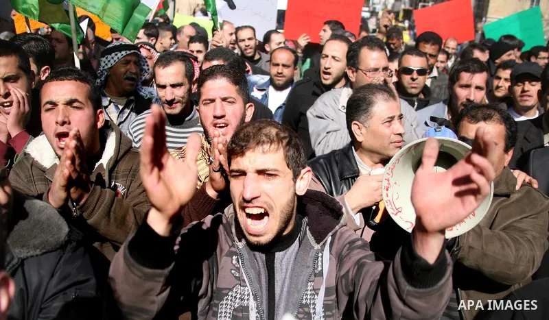 Palestinians protest against rising prices and taxes in the West Bank city of Hebron. Saturday, Feb. 4, 2012. Palestinian Authority Prime Minister Salam Fayyad has sparked a furor with a push to get Palestinians to pay m...