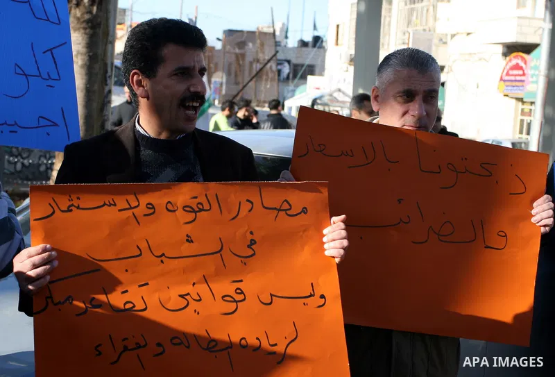 Palestinians protest against rising prices and taxes in the West Bank city of Ramalllah, Saturday, Feb. 4, 2012. Palestinian Authority Prime Minister Salam Fayyad has sparked a furor with a push to get Palestinians to pa...