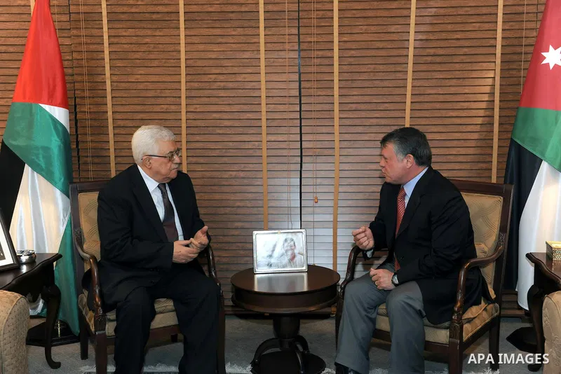 Palestinian President Mahmoud Abbas (Abu Mazen) meets with King Abdullah II in the Jordanian capital of Amman on Feb 4,2012. Photo by Thaer Ganaim
