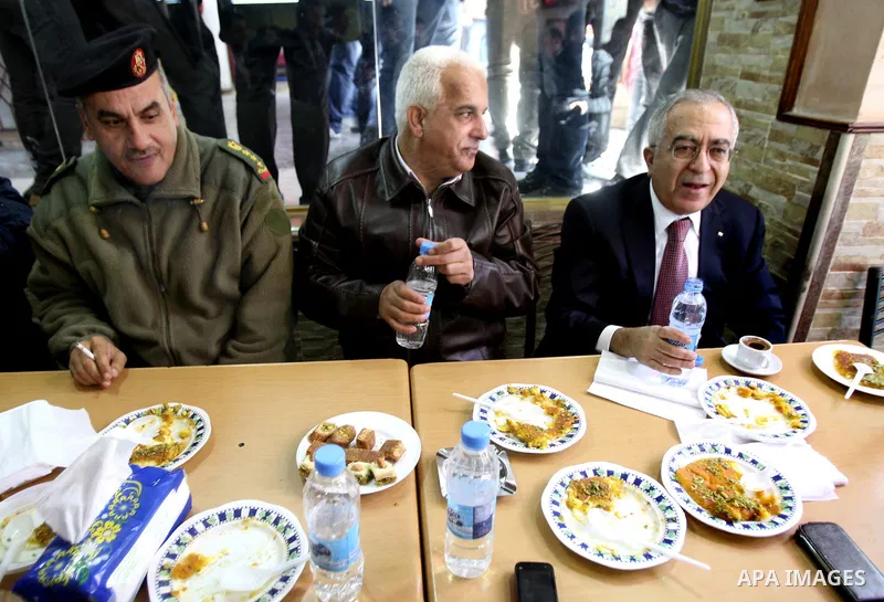 Palestinian Prime Minister Salam Fayyad visits the West Bank city of Nablus. Saturday, Feb. 4 , 2012. Palestinians protested Saturday in the West Bank against higher taxes and prices hike and demanded the Prime Minister...