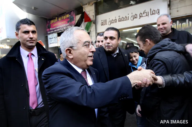 Palestinian Prime Minister Salam Fayyad visits the West Bank city of Nablus. Saturday, Feb. 4 , 2012. Palestinians protested Saturday in the West Bank against higher taxes and prices hike and demanded the Prime Minister...