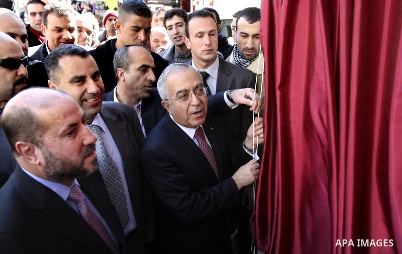 Palestinian Prime Minister Salam Fayyad visits the West Bank city of Nablus. Saturday, Feb. 4 , 2012. Palestinians protested Saturday in the West Bank against higher taxes and prices hike and demanded the Prime Minister...