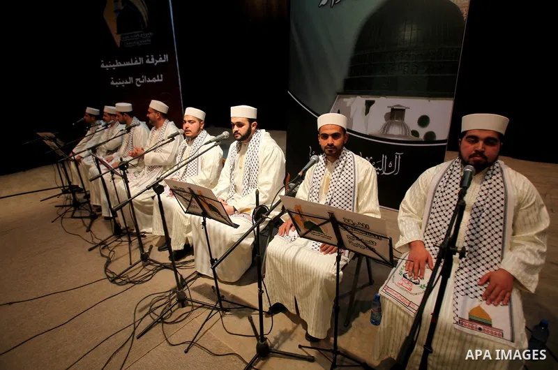 Palestinians attend a festival marking the birthday of Prophet Mohammad in Gaza City February 4, 2012. Photo by Ashraf Amra