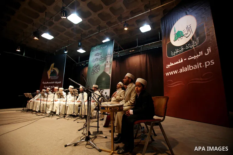 Palestinians attend a festival marking the birthday of Prophet Mohammad in Gaza City February 4, 2012. Photo by Ashraf Amra