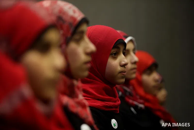 Palestinians attend a festival marking the birthday of Prophet Mohammad in Gaza City February 4, 2012. Photo by Ashraf Amra