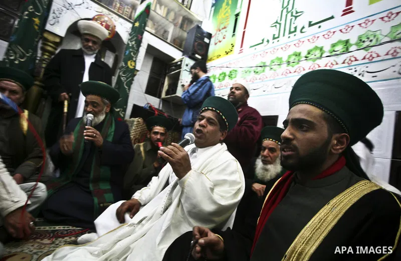 Members of a palestinian Sufi Muslim group play traditional instruments during the birthday of Prophet Mohammad, in Al-Nusirat refugee camp on 04 February 2012. Muslims across the world celebrated the birth of the Prophe...