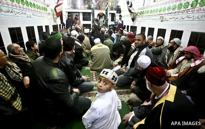 Members of a palestinian Sufi Muslim group play traditional instruments during the birthday of Prophet Mohammad, in Al-Nusirat refugee camp on 04 February 2012. Muslims across the world celebrated the birth of the Prophe...